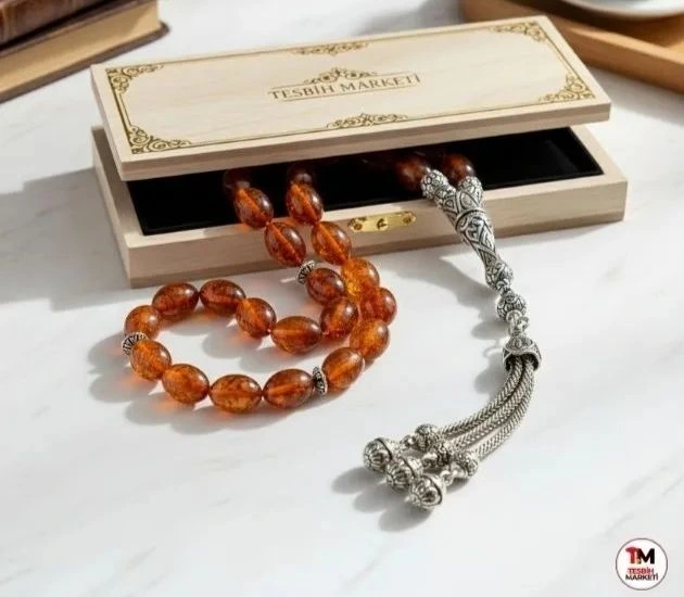 Tesbih Marketi özel ahşap hediye kutusunda ateş damla kehribar tesbih ve gümüş kazaziye